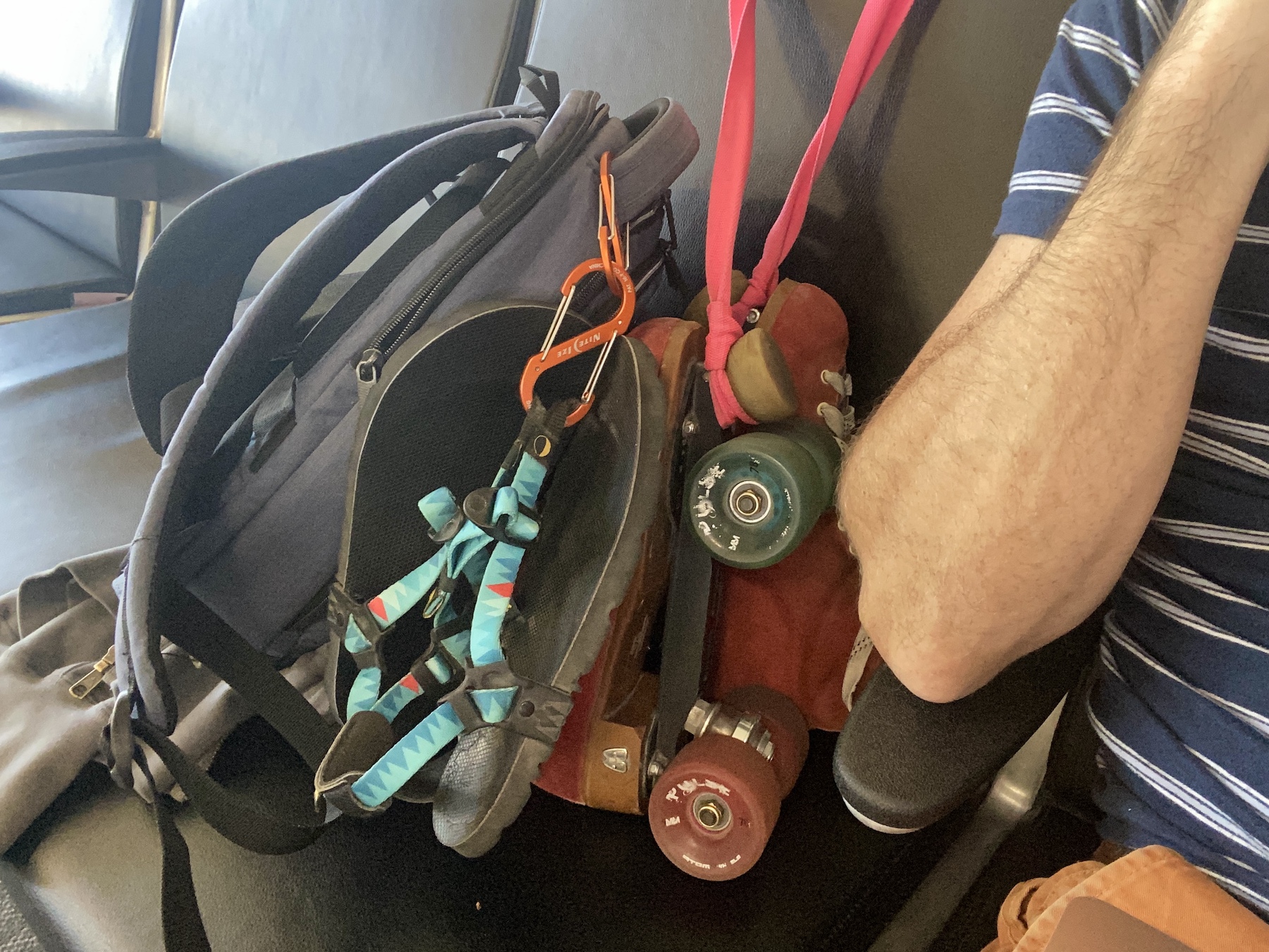 My carry-on luggage for the trip to Christchurch: backpack, sandals, and roller skates